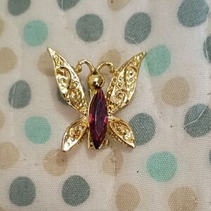 Gold Butterfly Brooch with Purple Gemstone